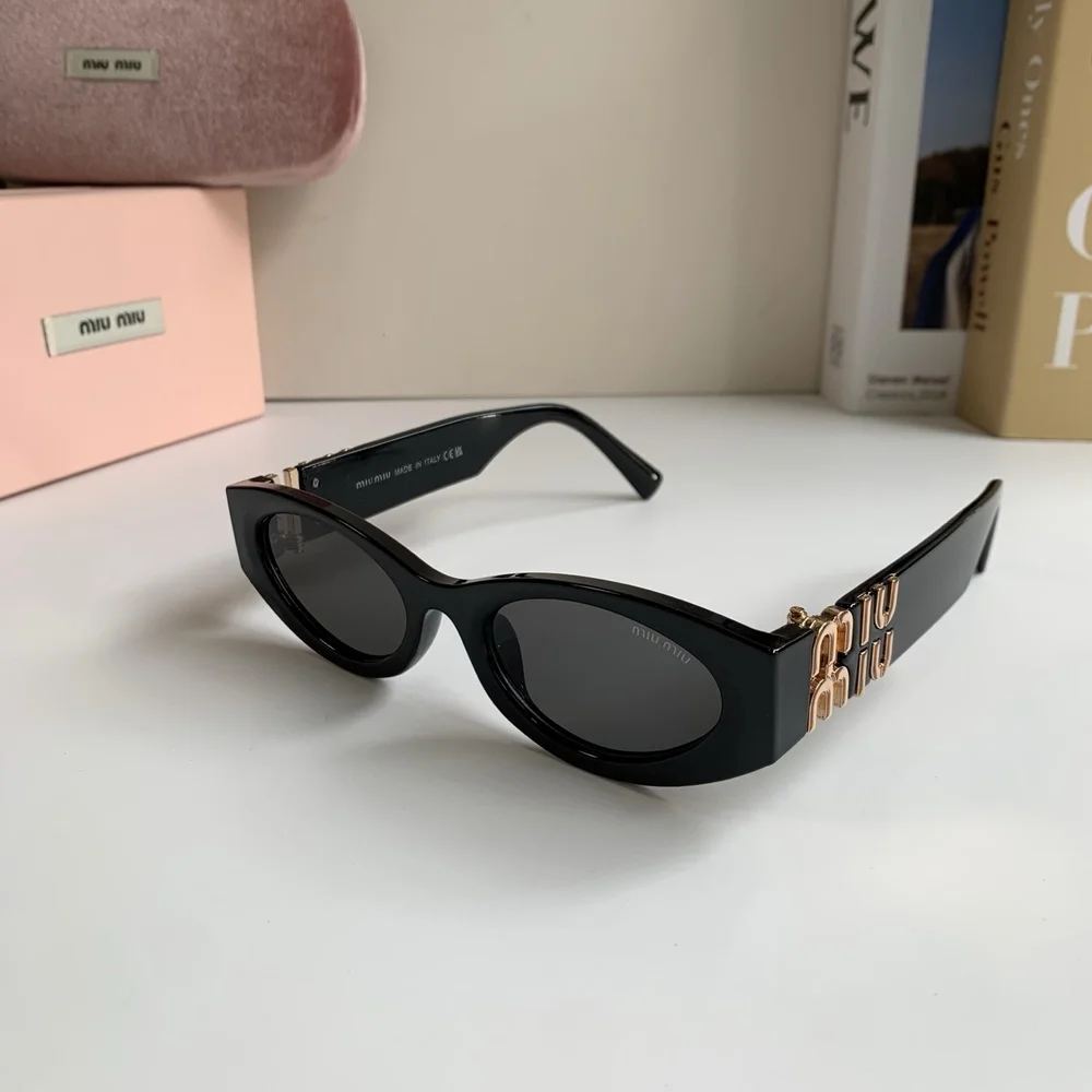 Miu Miu black sun protection sunglasses and aviator sunglasses